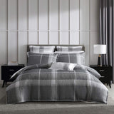 Super King Duvet Cover Set in Cannon Charcoal featuring subtle check pattern, soft jacquard fabric, and elegant self-flanged edges.