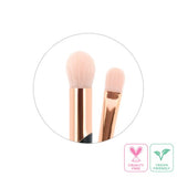 Dual-ended black and rose gold concealer and blending brush with soft synthetic bristles for flawless makeup application.