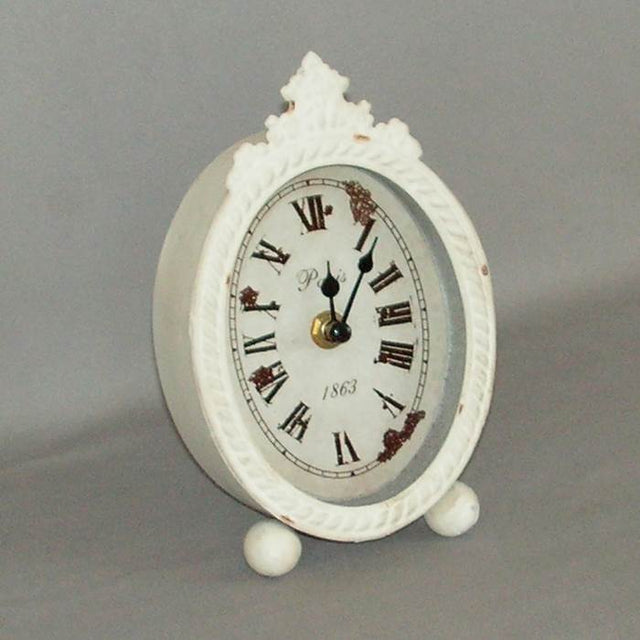Elegant cream mantel clock crafted from wood and metal, perfect for enhancing home decor in any style.