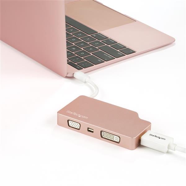 Rose gold USB-C multiport video adapter with HDMI, VGA, DVI, and Mini DisplayPort outputs for 4K video connectivity.