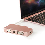 Rose gold 4-in-1 USB-C Multiport Adapter connecting to VGA, DVI, HDMI, and Mini DisplayPort displays with UHD 4K support.