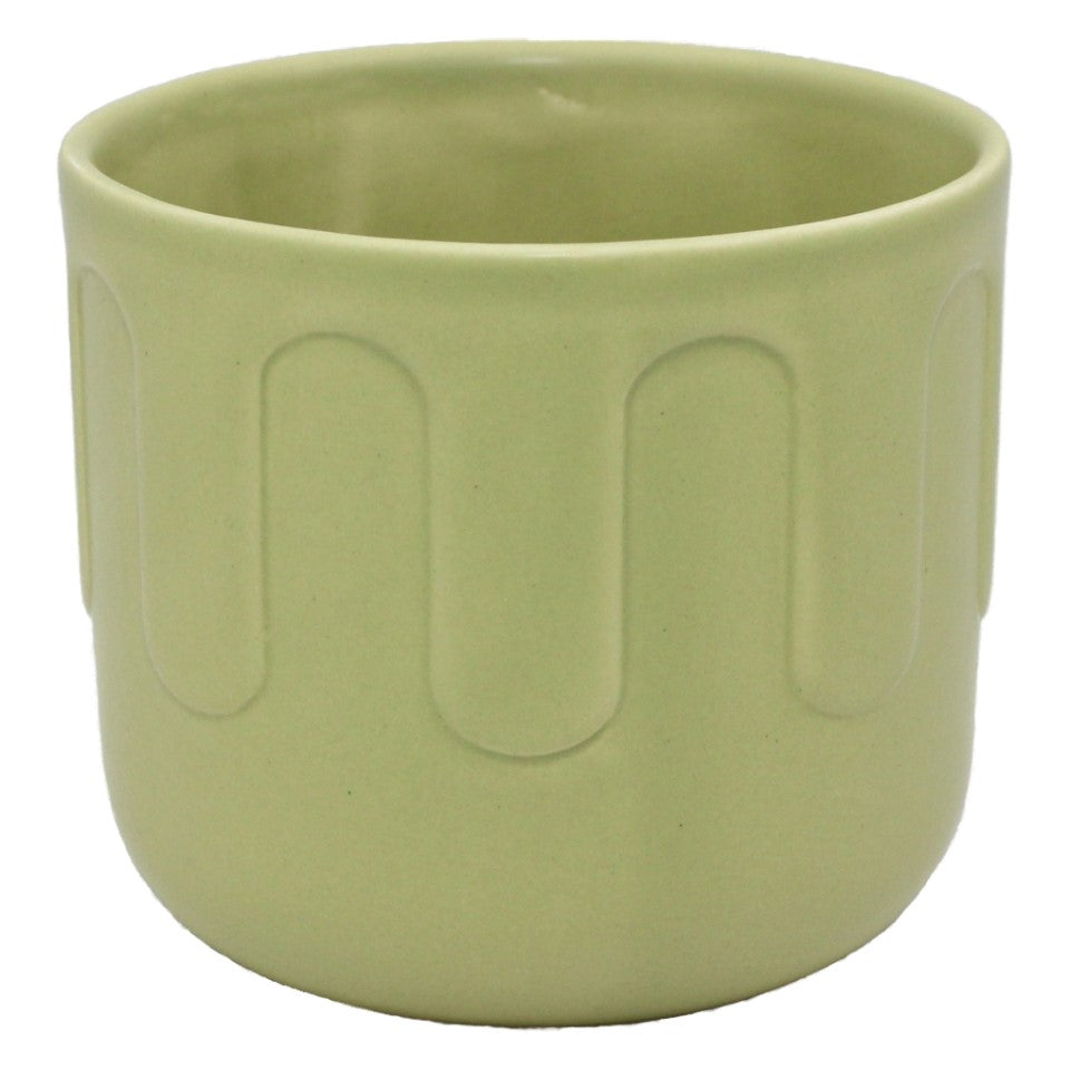 Round ceramic pot in matt green with a drip pattern, perfect for indoor plants, featuring a drainage hole for optimal growth.
