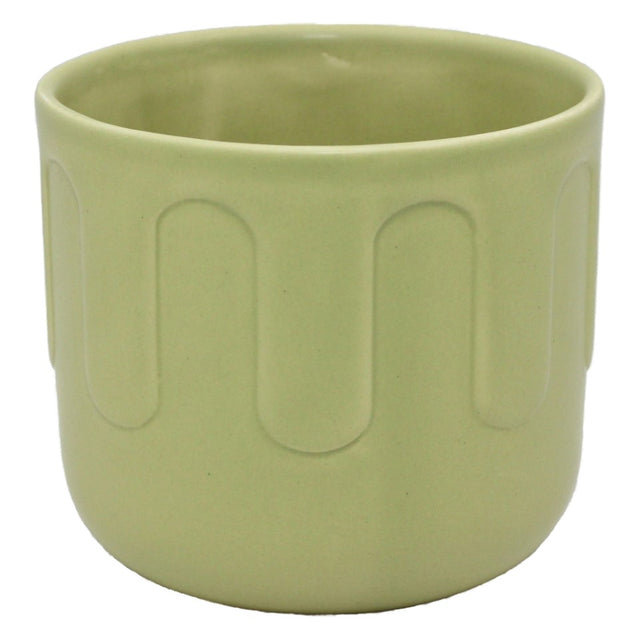 Round ceramic pot in matt green with a drip pattern, perfect for indoor plants, featuring a drainage hole for optimal growth.