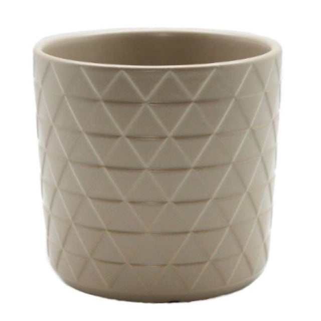 Ceramic planter in light brown with a geometric design, featuring a drainage hole, ideal for small plants or floral arrangements.