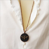 Vintage Honey Bee Circle Necklace featuring a black acrylic pendant and antique copper finish on a 75cm chain.