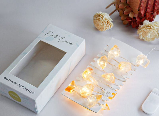 Battery-operated fairy lights with 20 citrine crystals, perfect for creating a warm and magical ambiance indoors or outdoors.