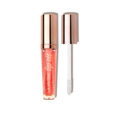 LA Colors Nourishing Lip Oil in Tangerine Twist; ultra-hydrating, gold flakes, fruity tint for soft, radiant lips.