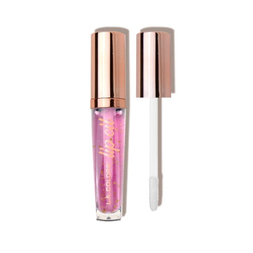 Nourishing Lip Oil in Berry Bursts with raspberry scent, gold flakes, and ultra-hydrating formula for soft, radiant lips.