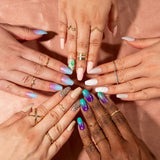 Colorful mermaid-inspired artificial nail tip kit with 33 durable, flexible tips for salon-quality manicures at home.