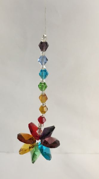 Vibrant 3 cm Chakra Star crystal for energy healing, meditation, and enhancing emotional well-being.