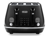 DeLonghi Distinta Moments 4 Slice Toaster in sleek black featuring dual controls, multiple functions, and removable crumb trays.
