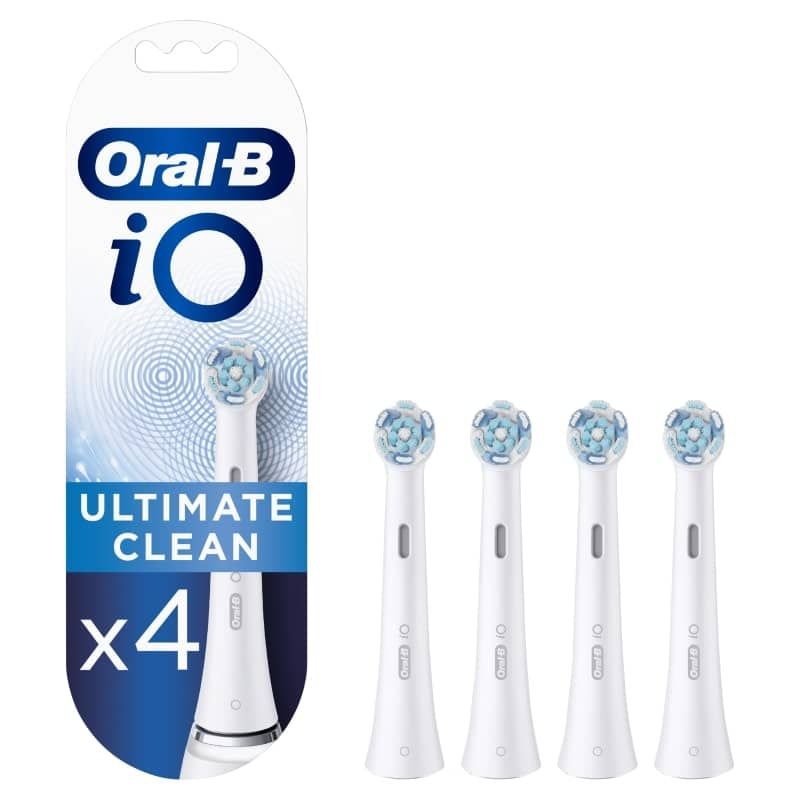 Oral B Ultimate Clean WHITE replacement toothbrush heads (4pk) for deep cleaning and plaque reduction with dual-length bristles.