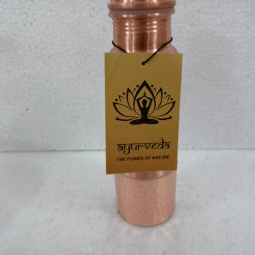 Handcrafted 750ml copper bottle designed to purify water, promoting health and well-being with Ayurvedic benefits.