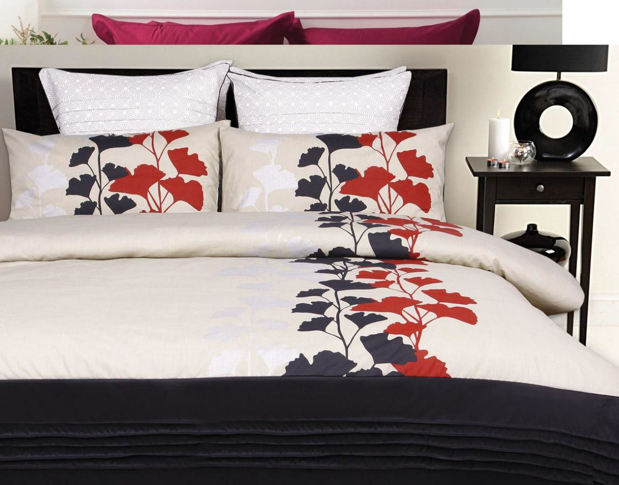 Double bed duvet set in stylish organic print with black pleat detailing, featuring ginkgo leaves in red and silver foil.