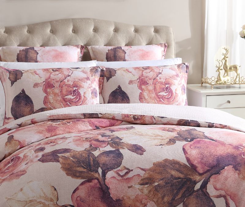 Elegant Queen duvet cover set featuring large floral blooms in blush tones, crafted from 100% cotton sateen for comfort.