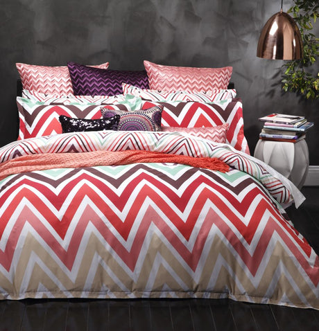 King Duvet Cover Set featuring vibrant chevron stripes, includes duvet cover and two pillowcases, perfect for a colorful bedroom.
