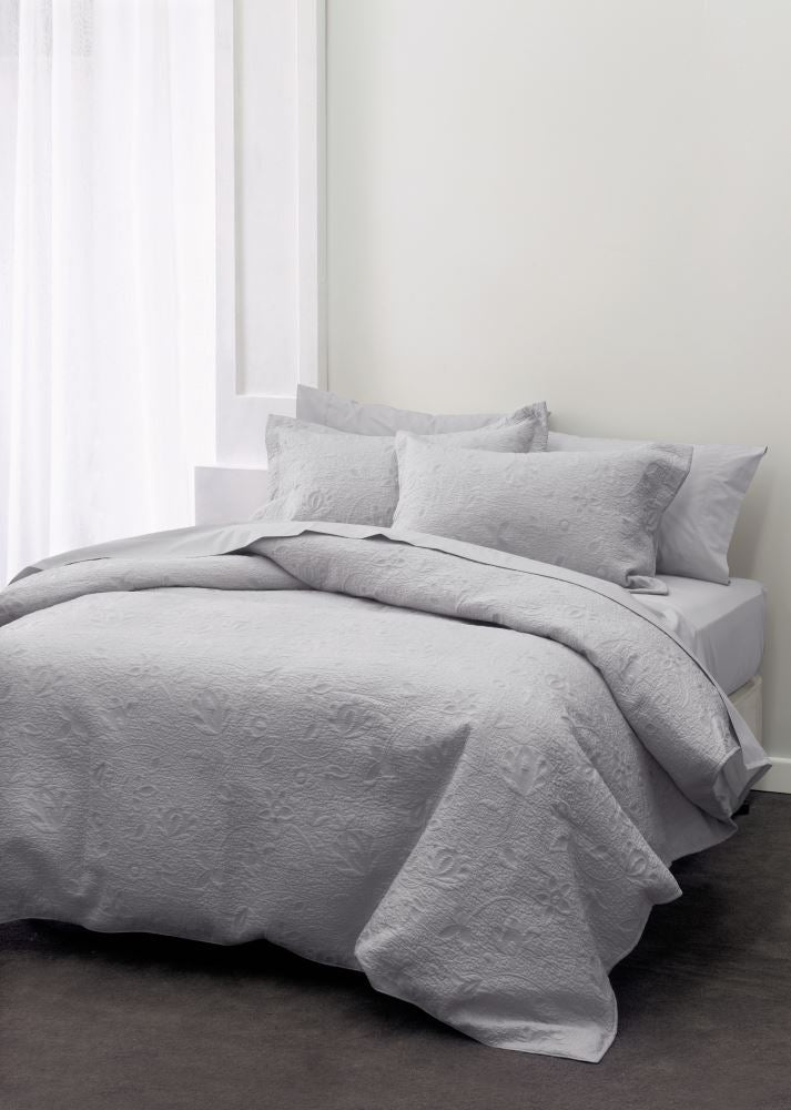 Queen-sized Chantel Grey bedspread by Savona, crafted from soft quilted cotton, includes two pillowcases for elegant decor.