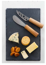 Set of 2 stylish stainless steel cheese knives in an elegant book-shaped display box, perfect for cheese lovers.