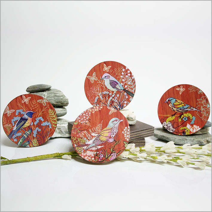 Set of 4 vibrant bird coasters on MDF with cork base, ideal for protecting surfaces and enhancing home decor.