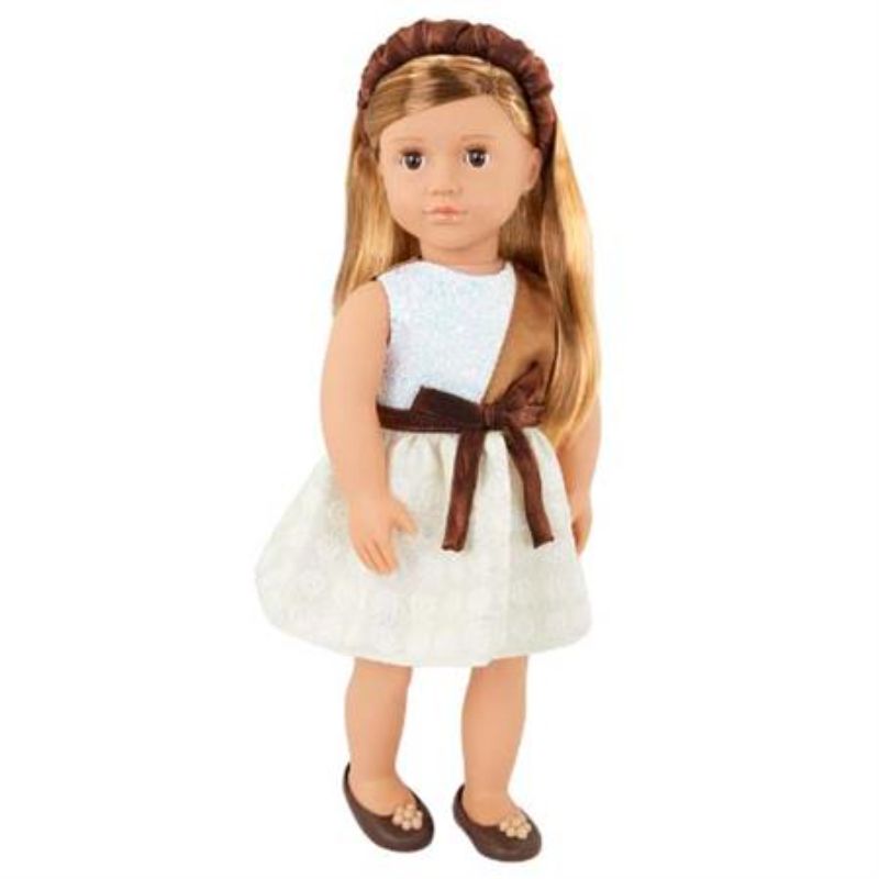 Our Generation doll Shelby with lifelike features, long blonde hair, and a chocolate-inspired outfit, perfect for imaginative play.