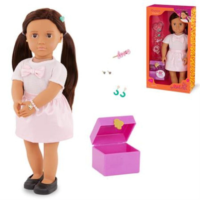 18-inch Our Generation doll Cristina with brown eyes, long brunette hair, and a stylish pink outfit, complete with piercable earrings.