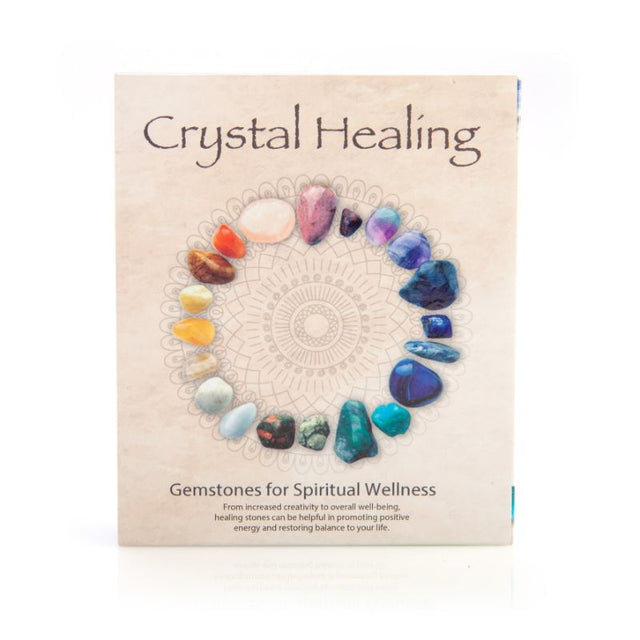 Crystal Healing Wellness Kit featuring 12 natural stones in a velvet pouch, packaged in a luxurious magnetic gift box.