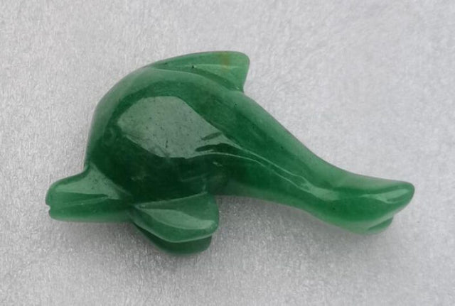 Dolphin-shaped aventurine gemstone figurine (5 cm), symbolizing harmony and calm, perfect for home decor or gifts.