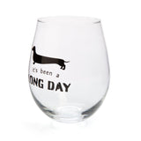 Hand-blown stemless wine glass with a dachshund silhouette and punny phrase, perfect for dog lovers and wine enthusiasts.