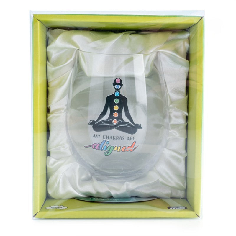 Hand-blown stemless glass with 7 chakra symbols and uplifting phrase, perfect for wellness enthusiasts.