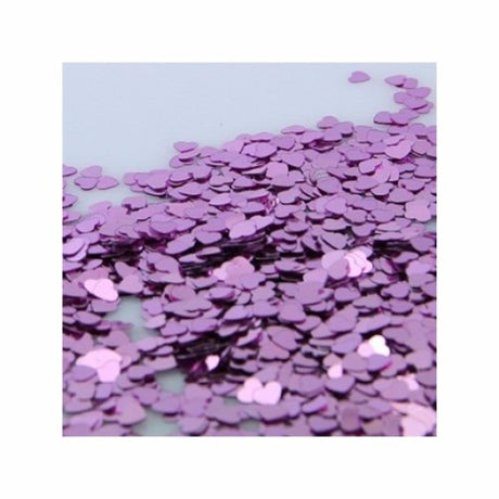 Heart-shaped pink confetti pack for weddings and celebrations, ideal for table scattering and party decorations.