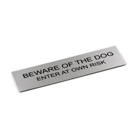 Adhesive "Beware Of The Dog" sign in brushed stainless steel, measuring 170 x 50 mm, with stylish, weather-resistant design.
