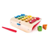 Colorful wooden shape sorter xylophone for toddlers, combining music and education through shape matching and sound exploration.