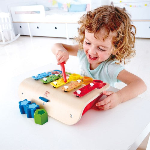 Hape Shape Sorter Xylophone: a colorful, multifunctional toy combining music, shape sorting, and fine motor skill development for toddlers.