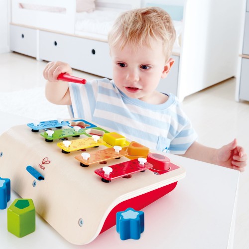 Hape Shape Sorter Xylophone features vibrant colors, musical elements, and shape sorting for toddlers' learning and fun.