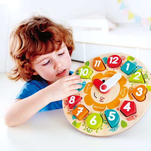 Colorful Hape Chunky Clock puzzle with easy-to-handle pieces for teaching time-telling and developing fine motor skills.