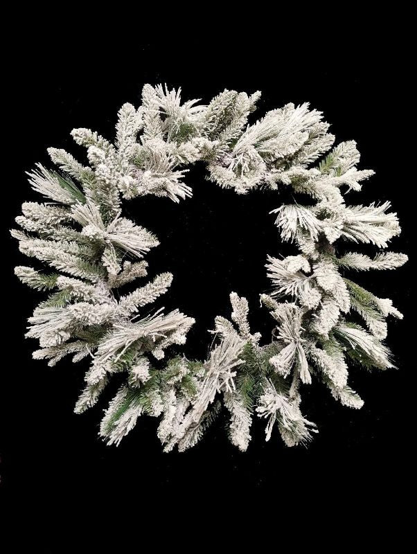 36" Snowy Mixed Pine Wreath featuring frosted pine branches, ideal for holiday decor on doors or walls.