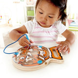 Colorful Hape Go Fish Go Maze Puzzle with magnetic wand guiding marbles, enhancing fine motor skills and problem-solving.