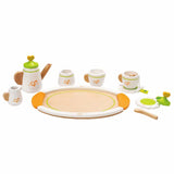 Colorful wooden tea set for two, featuring 12 pieces for imaginative role-play and social interaction. Perfect for little hands!