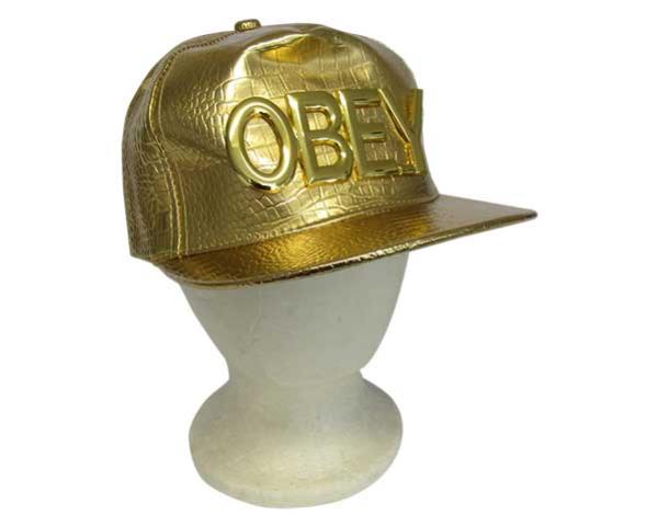 Colorful Bling Obey Gold cap with flat peak, adjustable fit, and luxurious golden embellishments for stylish sun protection.