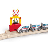 Hape Automatic Train Bell Signal with ringing feature enhances imaginative play for kids aged 3+, attachable to train tracks.