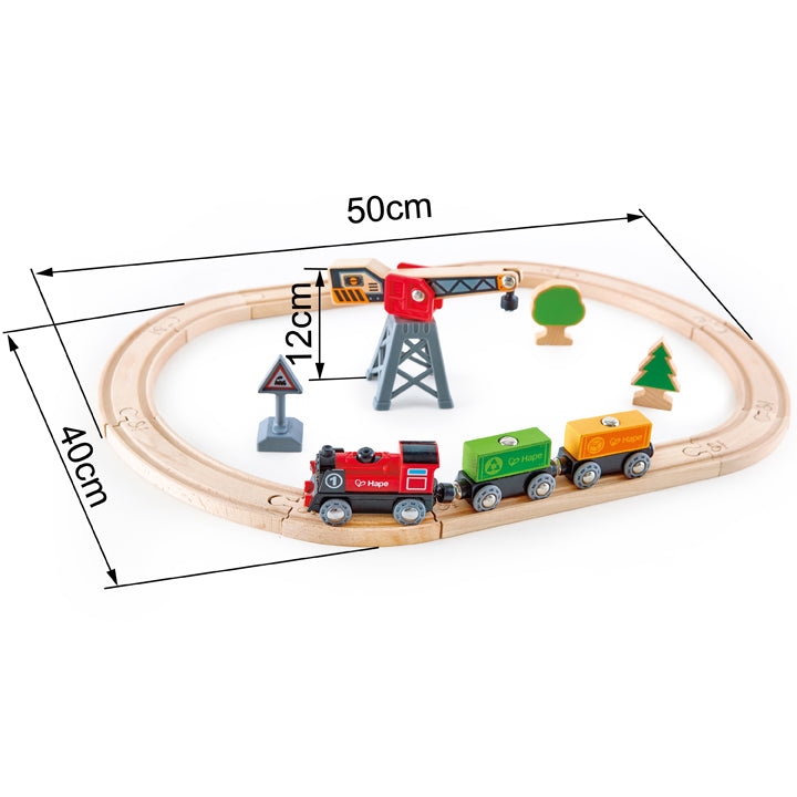 A colorful train set featuring a magnetic crane for loading containers, designed to enhance play and learning for kids 3+.