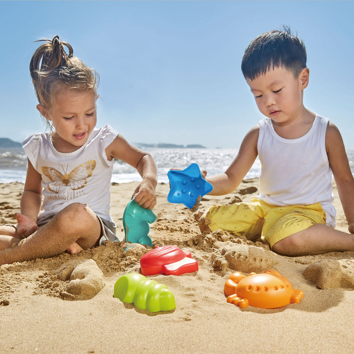 Colorful Hape sea creatures toy set for toddlers, designed for sensory play and imaginative adventures in water or sand.