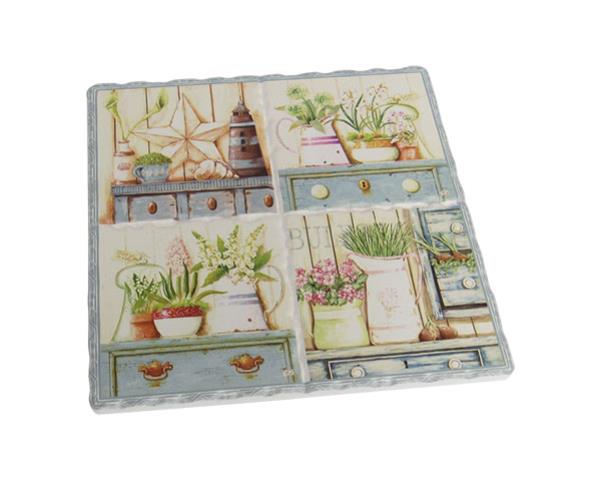 Cork-backed ceramic trivet with a vibrant garden design, measuring 15.5 cm x 16 cm for protecting surfaces from heat.