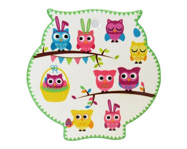 Ceramic owl trivet with cork backing, 15.5cm x 16cm, protects surfaces from heat with a whimsical design.