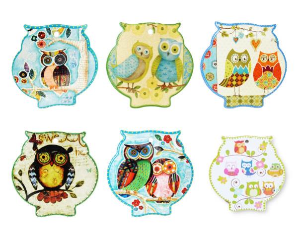 Charming set of six owl-themed trivets, made of cork-backed ceramic, perfect for protecting surfaces and adding whimsy.