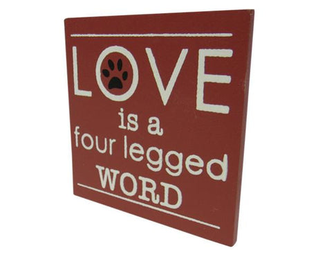 Fridge magnet featuring the phrase "Love is a four legged word," perfect for dog lovers, measures 7 cm x 7 cm.