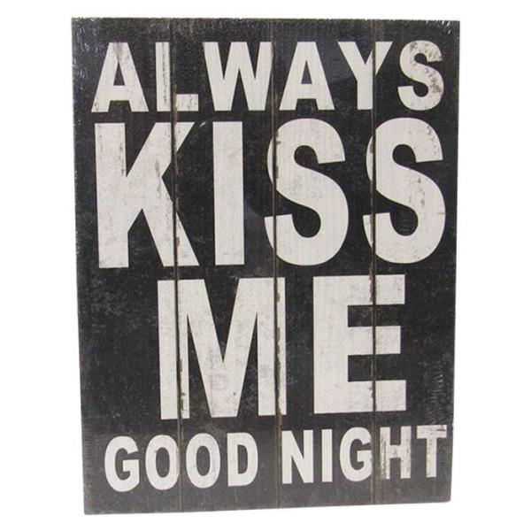 Textured wall art featuring the heartfelt message "Kiss Goodnight," perfect for creating a warm bedroom atmosphere.