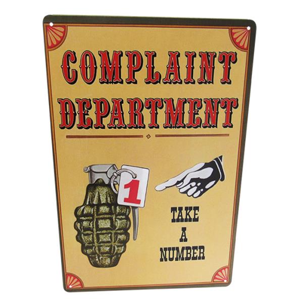 Retro tin wall art sign featuring whimsical "Complaint Department" design, perfect for home or office decor.