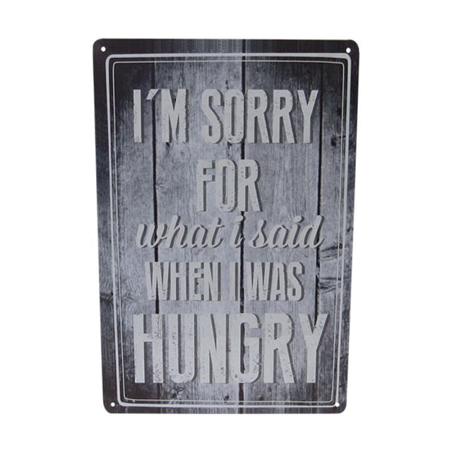 Retro tin art sign "Hungry," 30cm x 20cm, featuring bold colors and a playful food theme for kitchens and cafes.