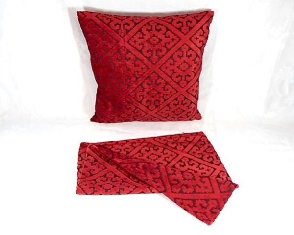 Vibrant red cushion cover in thick fabric, 44cm x 44cm, with easy zip access for effortless cleaning and style enhancement.